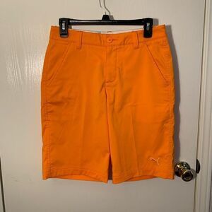 Puma EUC orange jackpot dry cell golf shorts Size 28